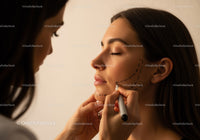 Woman with Facial Markings Getting Cosmetic Surgery in Clinic