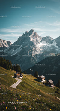 Scenic Mountain Landscape with Snowy Peaks and Green Meadows