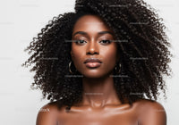 Elegant African American Woman with Curly Hair in Studio Portrait