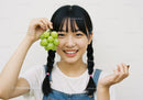 Young Girl Holding Fresh Green Grape Bunch With Smiling Face