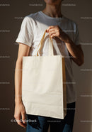 Person Holding Plain White Reusable Tote Bag