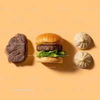 Gourmet Burger with Lettuce and Tomato Next to Grilled Steak and Dumpling