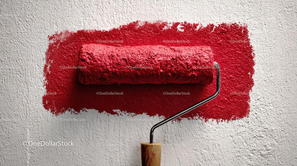 Red Paint Roller Applying Bright Red Color on Wall for Home Renovation