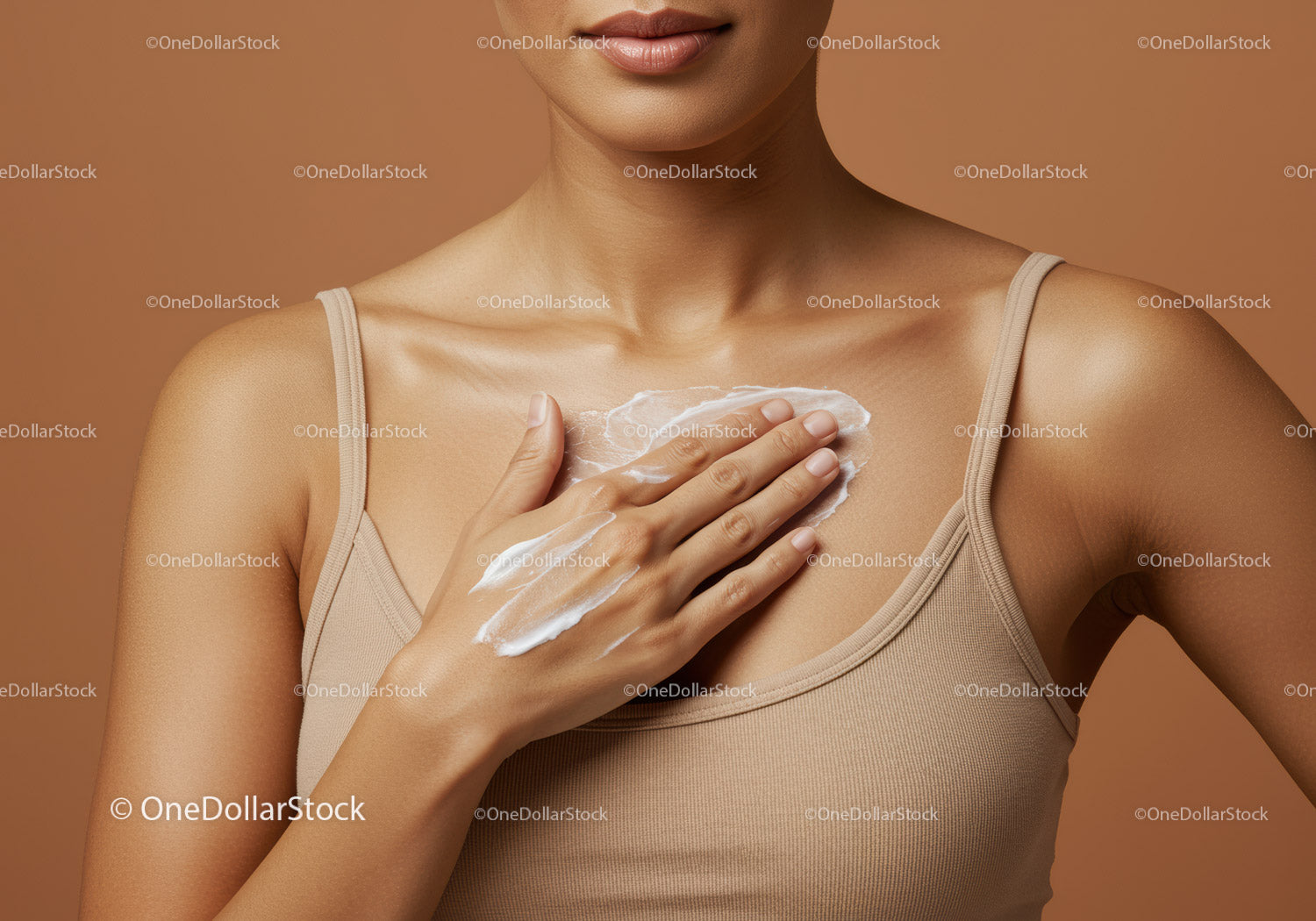 Close-up of Woman Applying Skincare Cream on Chest with Soft Background