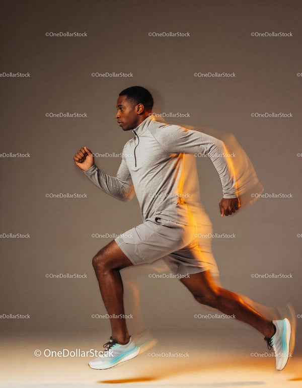 Athlete sprinting indoors with dynamic motion blur
