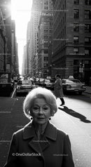 Black and White City Street Scene with Elderly Woman and Pedestrian
