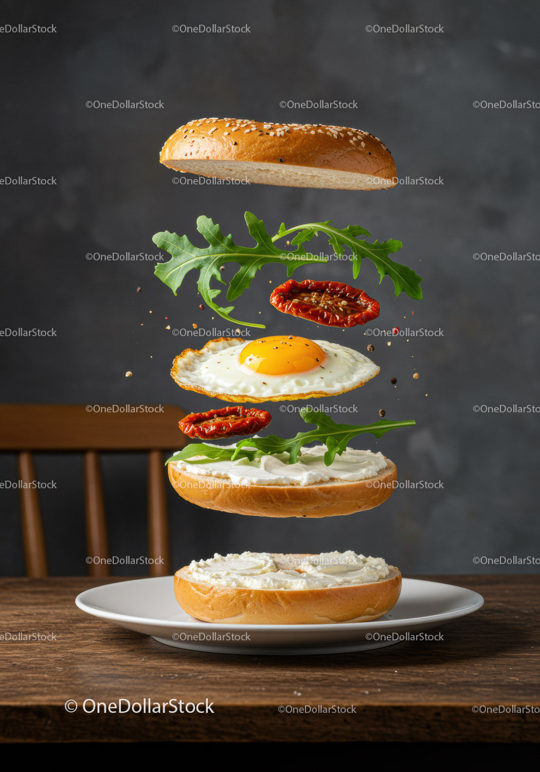 Fried egg and arugula sandwich ingredients floating