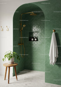 Modern Bathroom Shower Niche with Green Tiles and Brass Fixtures