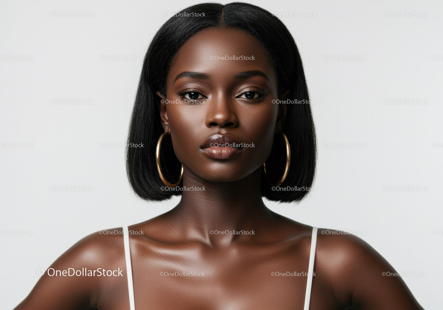 Elegant Portrait of a Black Woman with Gold Hoop Earrings and Smooth Skin