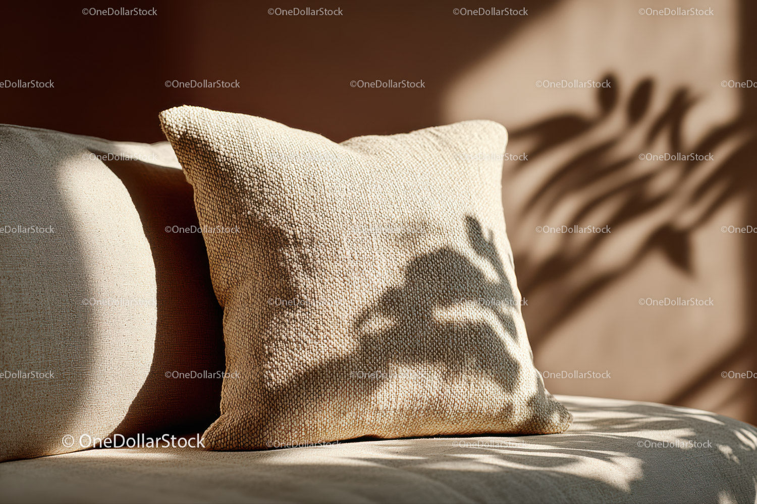 Elegant Beige Cushion with Textured Fabric and Sun Shadows