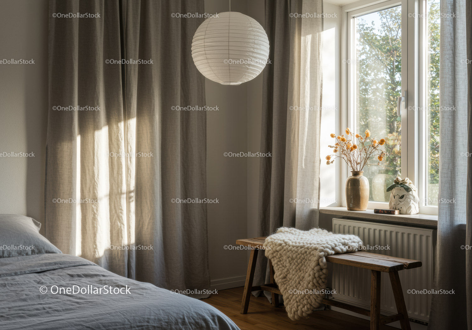 Cozy bedroom corner with natural light and simple decor