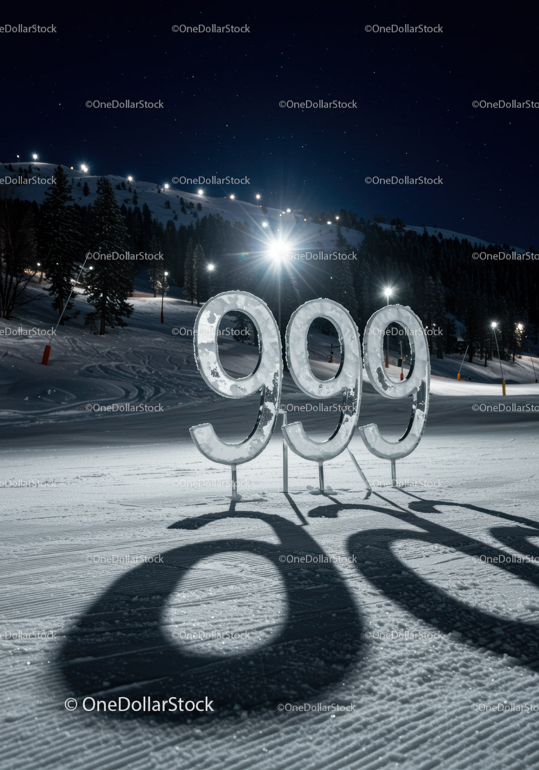 Snowy illuminated 999 sign on winter mountain slope