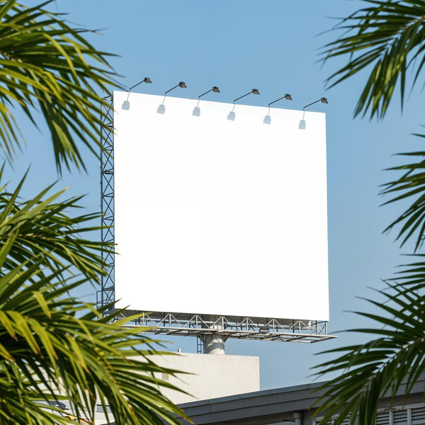 Blank Outdoor Billboard Framed by Palm Trees on Sunny Day JPG Mockup Image