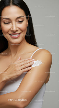 Woman Applying Moisturizer for Healthy Glowing Skin