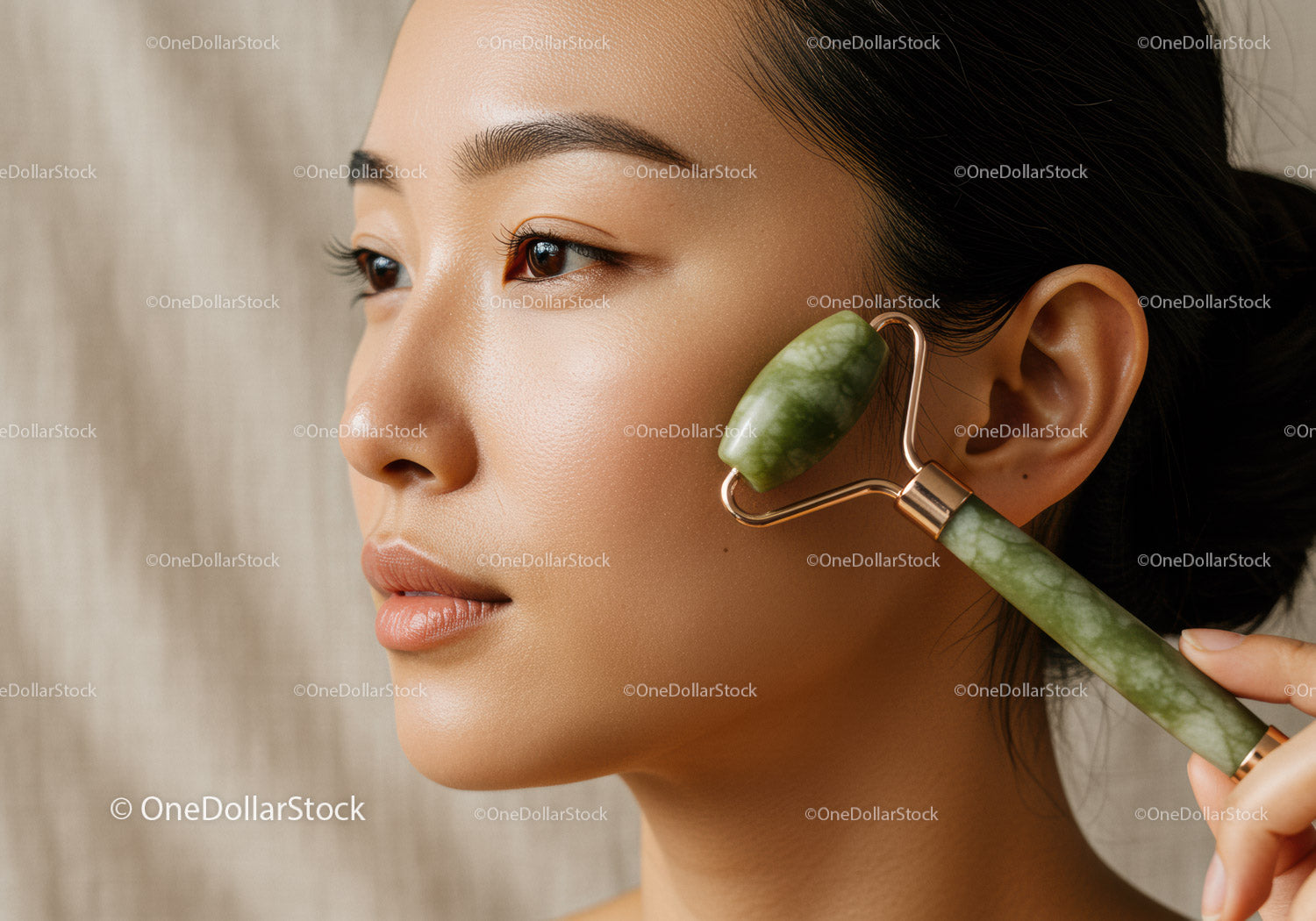 Woman Using Jade Roller for Facial Massage Skincare Routine
