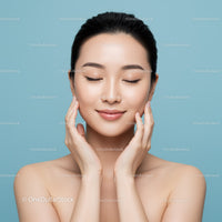 Portrait of a Calm Young Woman with Glowing Skin and Serene Expression