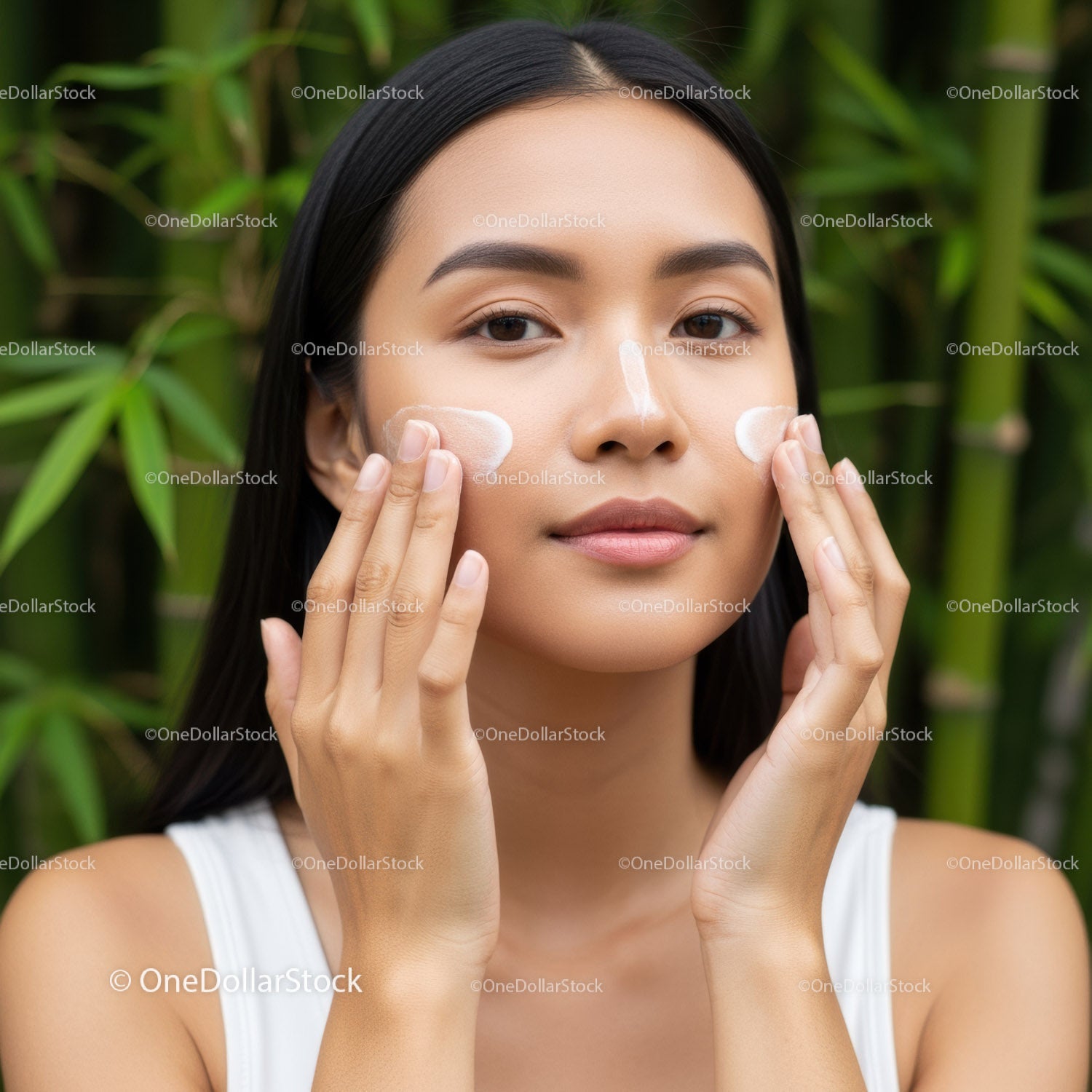 Young Woman Applying Cream for Natural Skin Care Outdoors