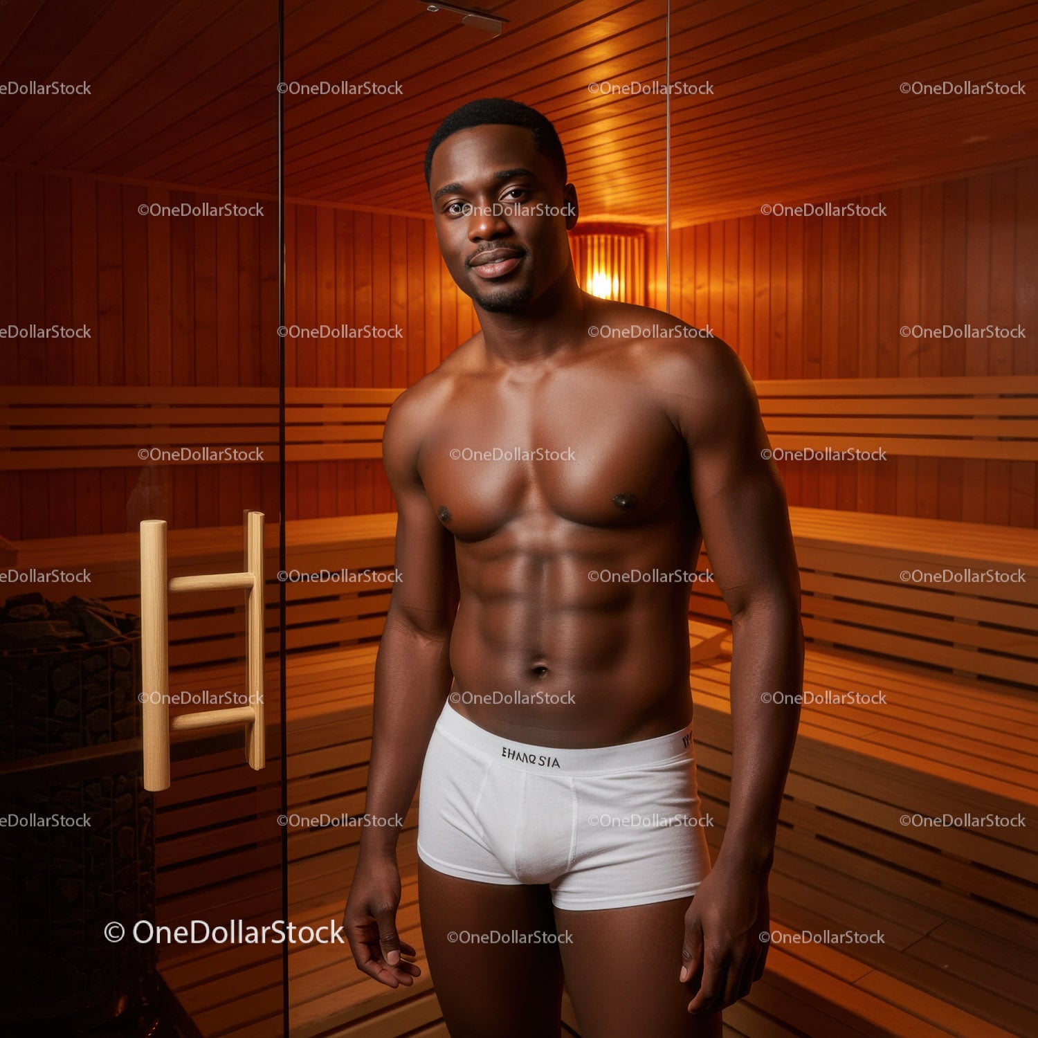 Healthy Male Fitness Model in Sauna Studio With Muscular Physique