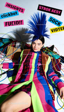 Young woman with vibrant blue mohawk and colorful outfit