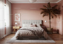 Modern Bedroom with Pink Walls and Elegant Decor Featuring a Large Palm Plant