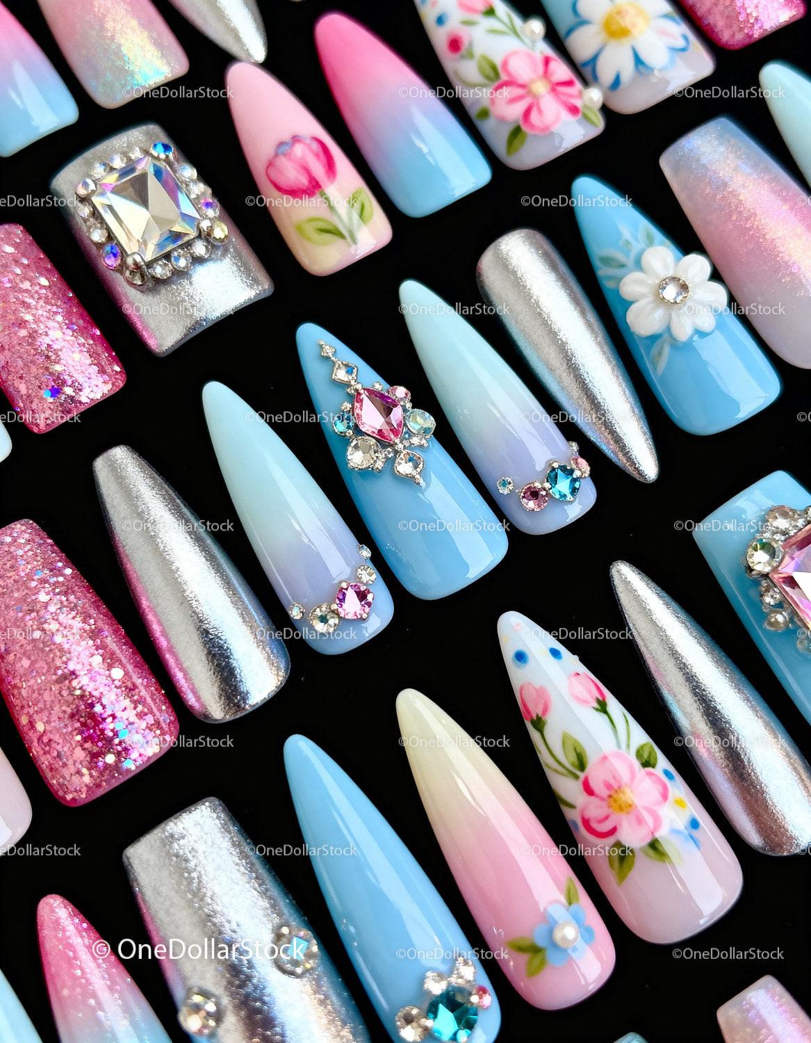 Elegant long nails with floral and jeweled designs