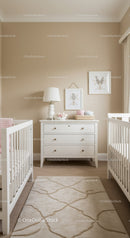 Modern Nursery with White Cribs and Beige Wall Decor