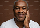Elderly Man Smiling Touching Face Portrait with Warm Background