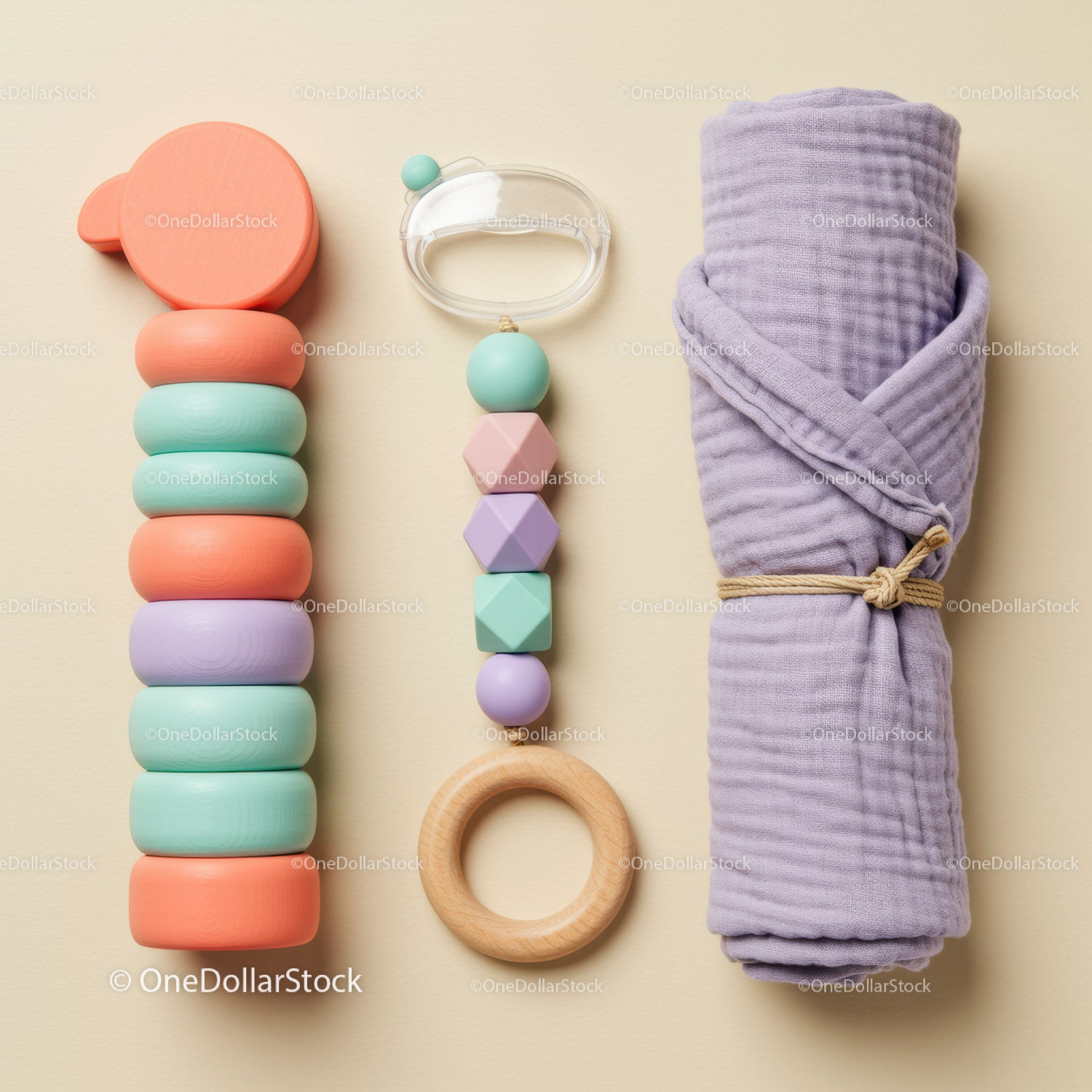 Pastel Baby Toys and Swaddle Blanket Set on Neutral