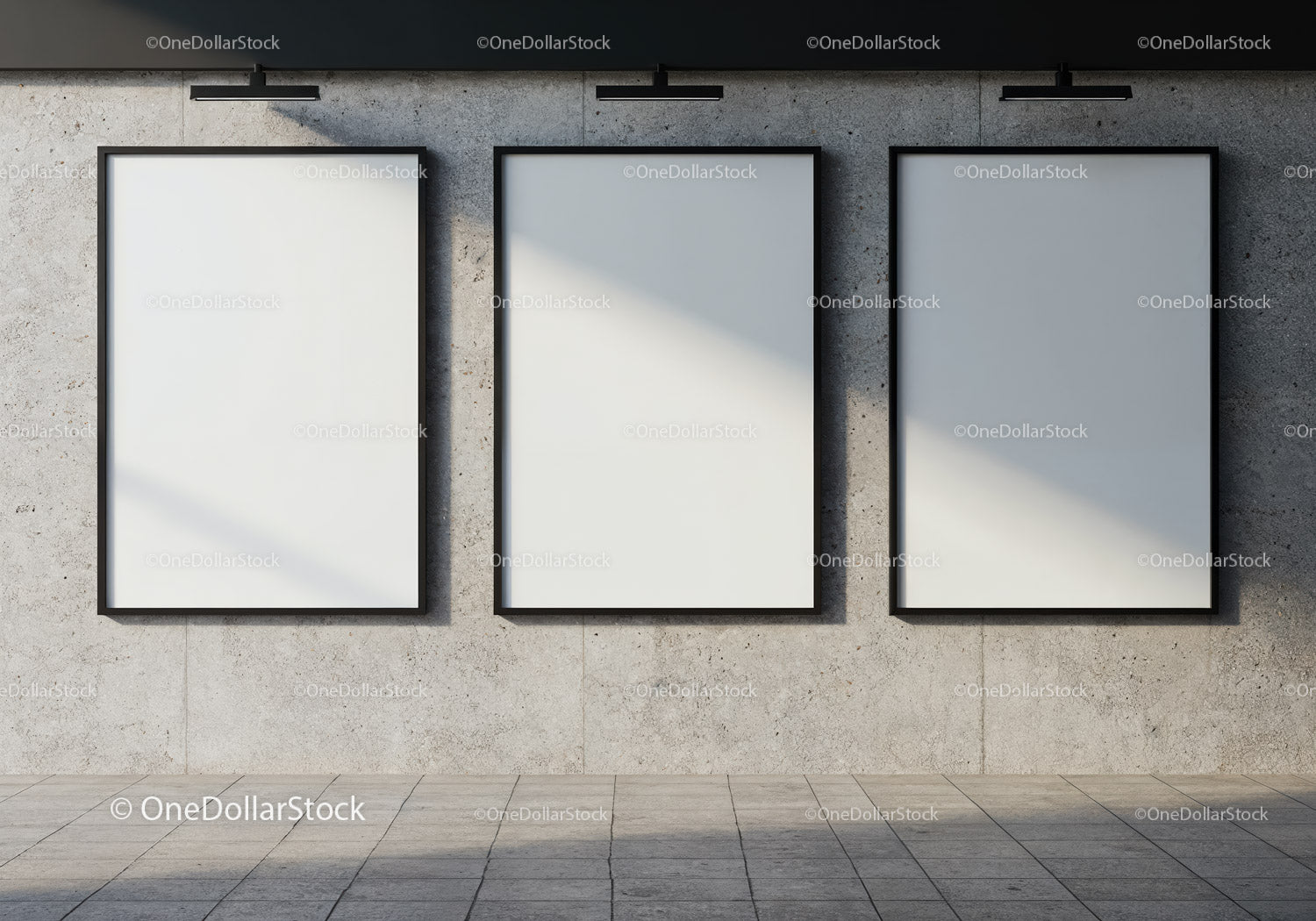 Three blank posters on concrete wall with soft lighting