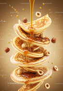 Stack of fluffy pancakes with syrup and hazelnuts