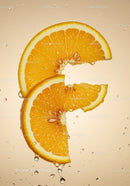 Fresh orange slices with water droplets on beige background