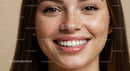 Close-up of smiling woman with freckles and natural skin