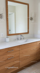 Wooden Bathroom Vanity with White Sink and Large Mirror
