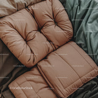 Beige Puffy Jacket Resting on Cushions for Cozy Winter Fashion