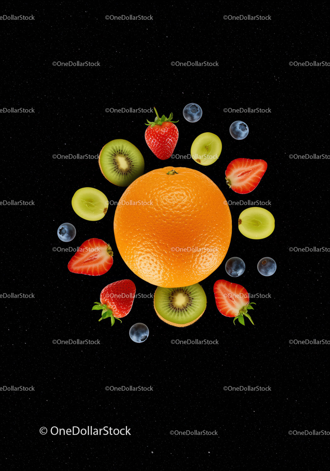 Fresh mixed fruit arrangement on black background