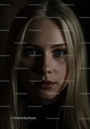 Close up portrait of thoughtful young woman with blue eyes