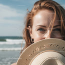 Bright Summer Woman with Straw Hat at the Beach