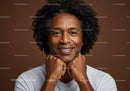 Happy African American Man with Curly Hair and Genuine Smile