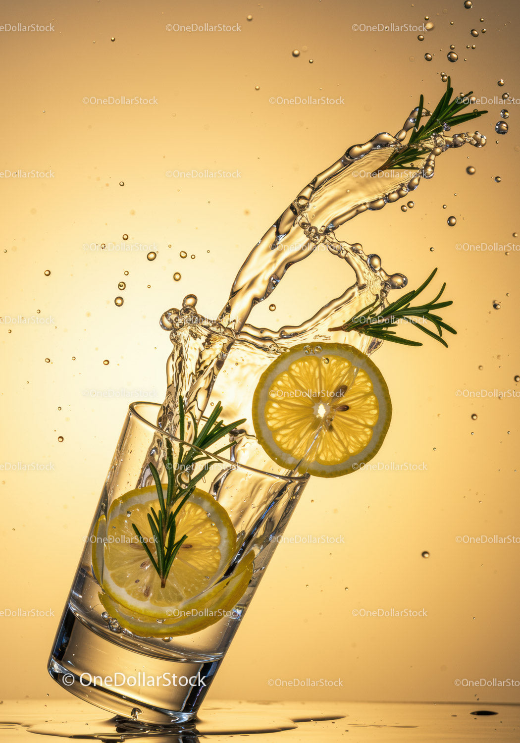 Refreshing lemon water splash with rosemary herb