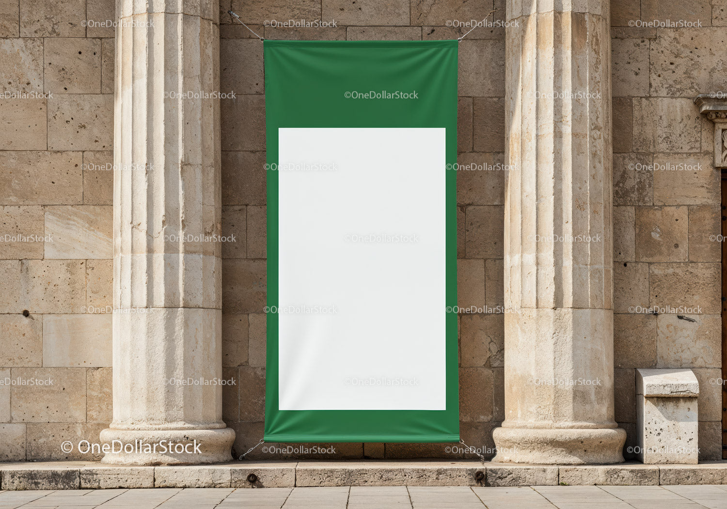 Large blank banner hanging between classical stone columns