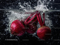 Fresh Organic Beetroot with Greens in Water Splash for Healthy Eating