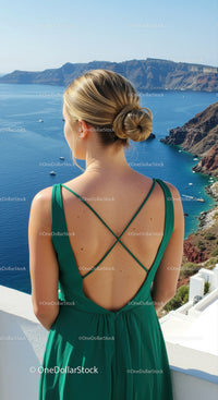 Woman in Green Dress Enjoying Stunning Coastal View