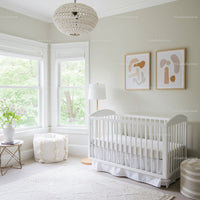Bright and Cozy Nursery with White Crib and Abstract Art