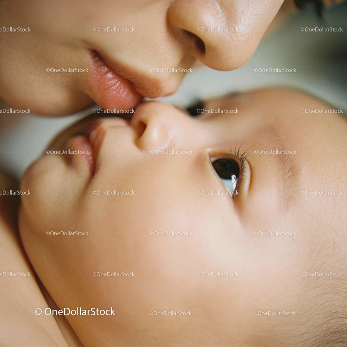 Tender moment between mother and newborn baby