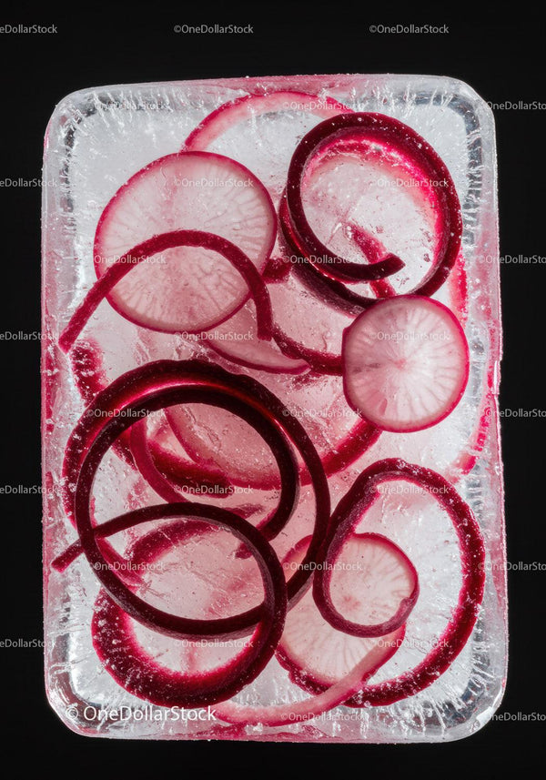 Fresh Radish Slices Frozen Inside Ice Cube Block