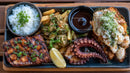 Delicious Grilled Octopus Seafood Platter with Rice and Sauce