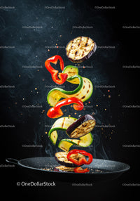 Grilled Vegetable Slices Suspended Above Pan
