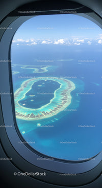 Aerial View of Tropical Islands and Atolls Over Bright Blue Ocean