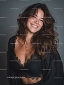 Joyful Woman With Wavy Hair Wearing Black Lace Top for Elegant Portrait