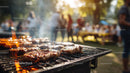 Grilled Steaks on Outdoor Barbecue Grill at Summer Picnic
